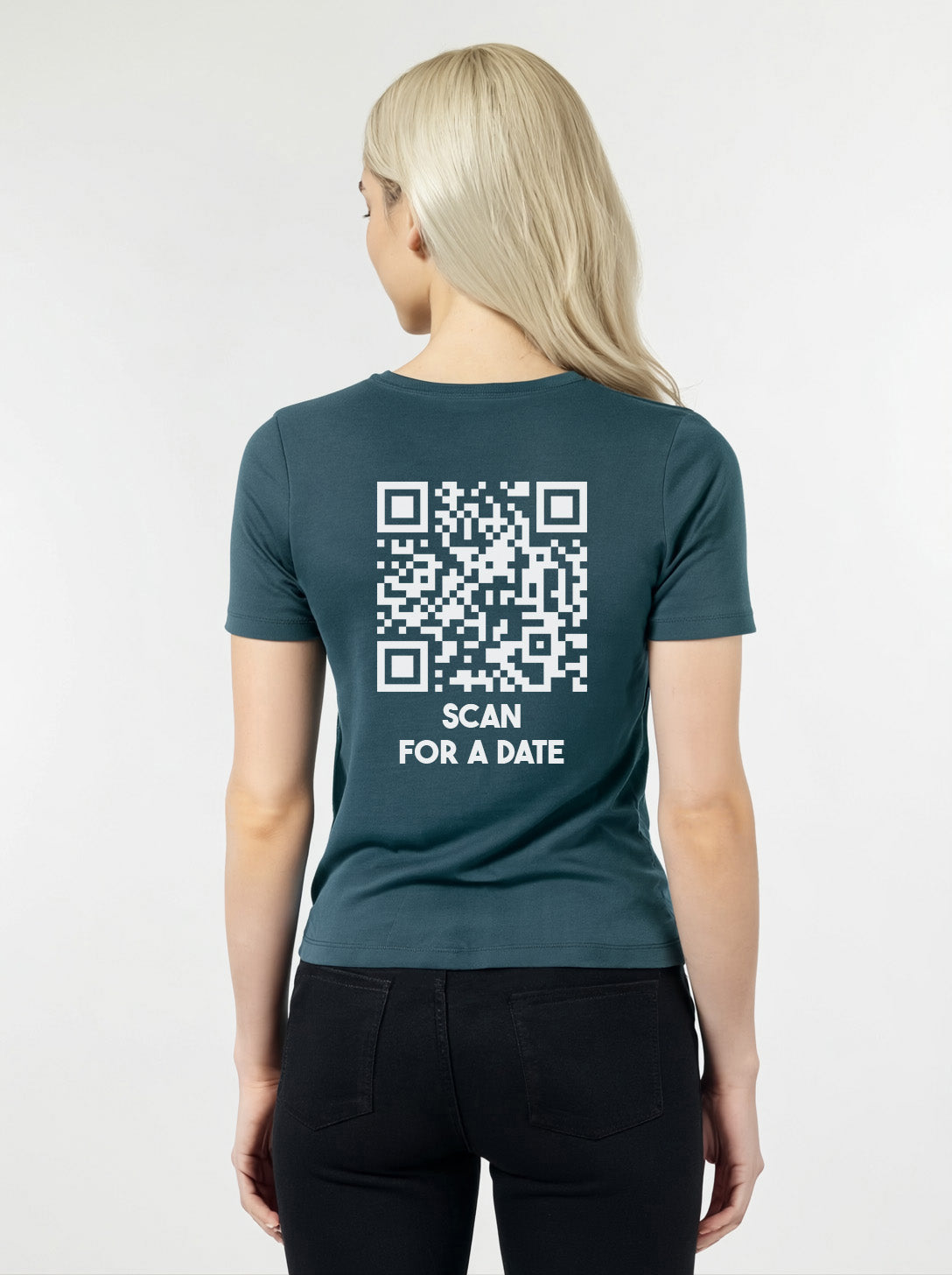 Women wearing a blue t-shirt from Cue R with a white QR code and 'SCAN FOR A DATE' text on the back.